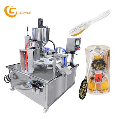 China New Type 5g 7g 10g Honey Spoon Food Filling Sealing Machine for sale