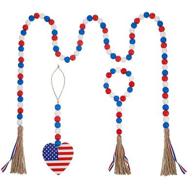 China Farmhouse Beads Independence Day Decorations Tassel Beads Rustic Wood Crafts Wooden Garland Home Hanging Decor for sale