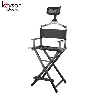 China Lightweight Foldable Black Frame OEM Keyson Barber Shop Aluminum Makeup Chair With Headrest And Foot Plate for sale