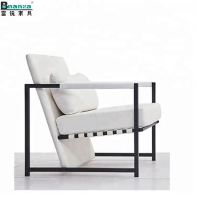 China Modern black upholstery designer tufted white leather famous chair for living room for sale