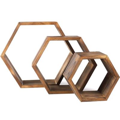 China Sustainable Wood Hexagon Beams Rustic Floating Honeycomb Beams Wall Mounted Wood Home Decoration Racks And Display Racks Storage Racks for sale