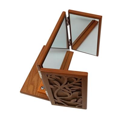 China Durable Custom Wooden Framed Solid Wood Makeup Folding Desk Mirror With Carving for sale