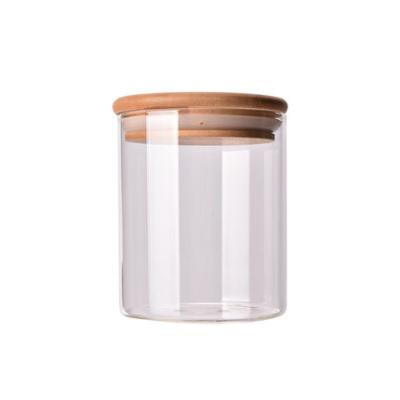 China Storage In High Heat Resistant Heatable Borosilicate Glass Jar Container With Bamboo Lid for sale