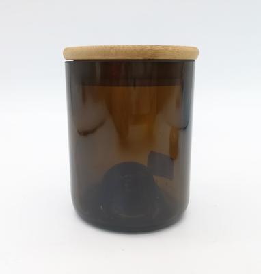 China COLOR CHANGING wholesale recycled wine bottle cut glass candle jars with bamboo or cork lid for sale