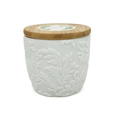 China Home Decoration TC16 5.2oz Capacity Embossed Wax Empty White Leaves Ceramic Jar Candle Holder With Bamboo Lid for sale