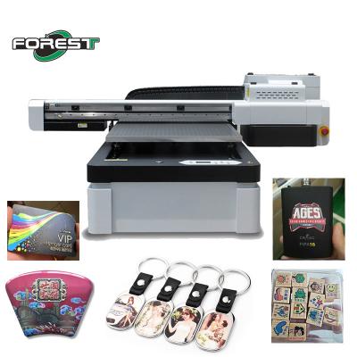 China CMYK Color UV Flatbed Printer Rotary Flatbed LED UV Printer for sale