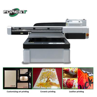 China Digital UV Flatbed Printing Machine Plastic Cylinder UV Printer for sale