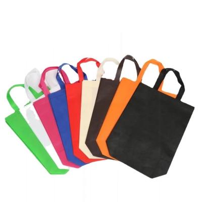 China Multi Colors Non Woven Bag Simply Eco Friendly Non Woven Shopping Tote Bag Disposable With Patch Handle for sale