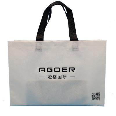 China Custom Eco Friendly Laminated Non Woven Shoe PP Disposable Promotional Shoe Foldable Shopping Bags for sale