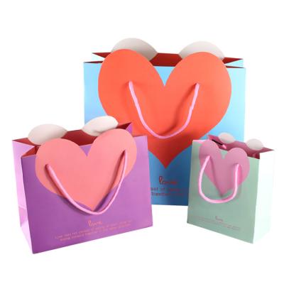 China Recyclable Elegant Birthday Gift Decoration DIY Packaging Customized Logo Luxury Kraft Gift Craft Wedding Paper Bags for sale