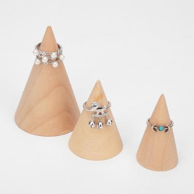 China 2022 Luxury Fashionable Store Showcase Factory Customized Wooden Cone Design Jewelry Rings Bracelet Display Stand for sale