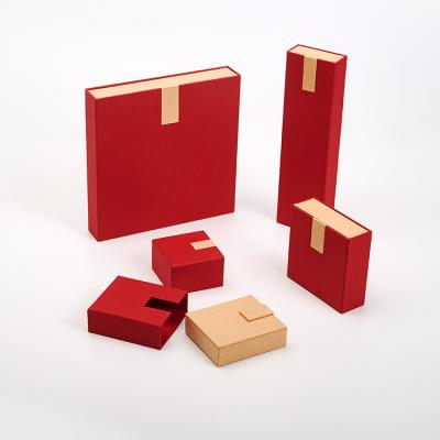 China Fashionable Wholesale Cardboard Jewelry Packaging Red Gold Magnetic Foldable Sliding Box For Jewelry Custom Logo for sale