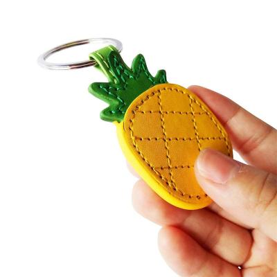 China Fashion Promotional Fruit Shape Key Chain Custom Design PU Leather Pineapple Key Chain for sale