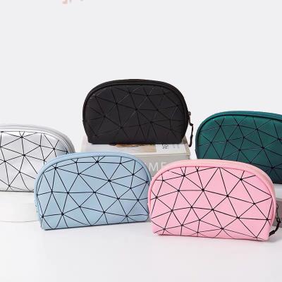 China Fashion Small PU Leather Case Women's Waterproof Stock Leather Toiletry Pouch Zipper Pouch Bag Travel Leather Cosmetic Storage for sale