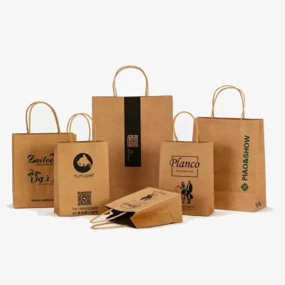 China Wholesale Custom Printed Luxury Recyclable Eco Friendly Recyclable Brown Gift Wrapping Paper Craft Paper Shopping Bag With Handles for sale