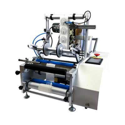 China Semi-automatic bottle sticker food round labeling machine/manual round bottle label applicator for sale