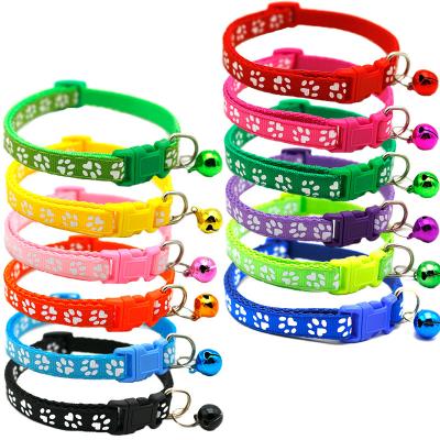 China Manufacturer Wholesale Stocked Cheap Multi-colors Paw Print Adjustable Nylon Pet Cat Dog Collar with Bell for sale