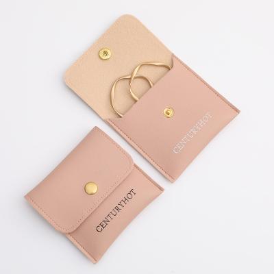 China Morden Pink 8*8cm Faux Leather Jewelry Bag Ring Bracelet Necklace Packaging Gift Bag With Logo Custom for sale