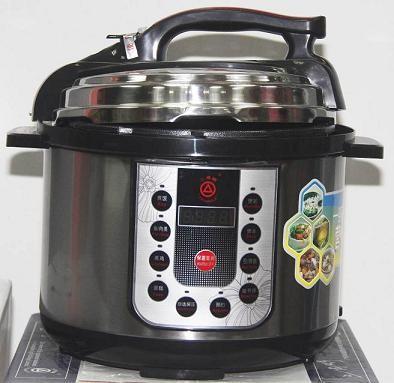 China computer panel electric pressure cooker with black heating plate and pl. handle for sale