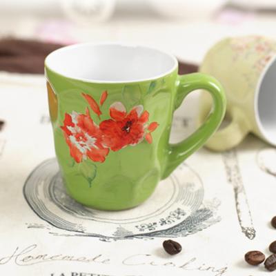 Cina Le tazze da caffè ceramiche su ordinazione libere del cadmio impresse hanno personalizzato il modello di fiore in vendita