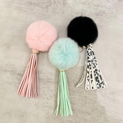 China 2023 Eco-friendly Key Chains Wholesale Cute Metal Multi Colors Plastic Ball Pompom Fur Key Chains Key Chain Accessories for sale