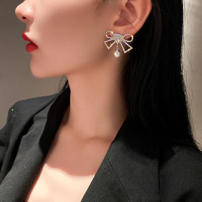 China New Cute Sweet Bow Freshwater Pearl Stud Earrings With Micro Crystal Bow Earrings Women Jewelry Accessories for sale