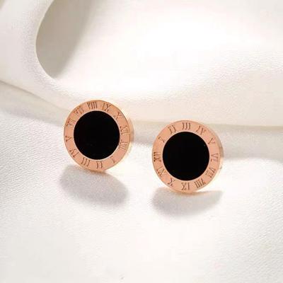 China FASHIONABLE European and American Roman digital ear studs female rose gold earrings light up luxury ear accessories wholesale for sale