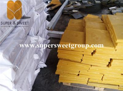 China Food Grade Natural Beeswax Slab , Pure Beeswax Block 25kgs/Bag Packing for sale