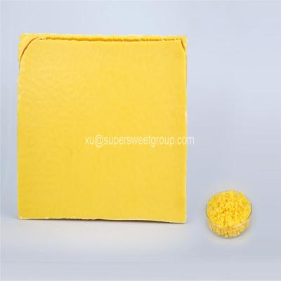 China OEM del punto de fusión del bloque 62-67 de la cera de abejas del amarillo de la categoría alimenticia disponible en venta