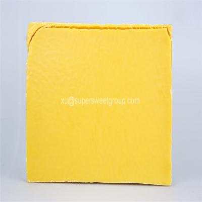 China 100% Pure Filtered Beeswax Slabs Food Grade Yellow Raw Beeswax Block for sale