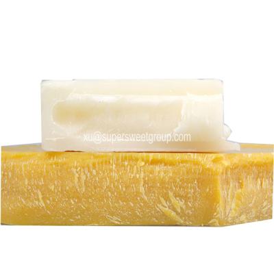 China Pure Solid BP Grade Food Additive Raw Beeswax Block for sale