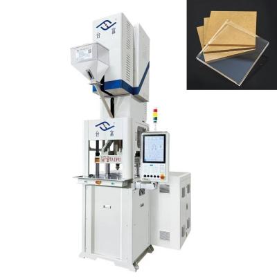 China Oil Electric Hybrid Vertical Injection Molding Machine For Making Acrylic Plate for sale