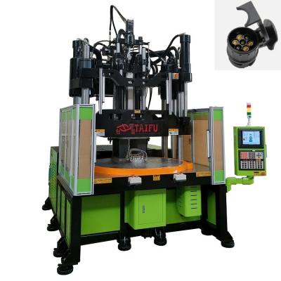 China 1176KN Clamping Force Rotary Table Injection Molding Machine for Ejector Distance 100mm for sale