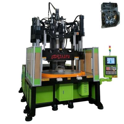 China Low Work Table Vertical Injection Molding Machine For Making ABS Control Module for sale