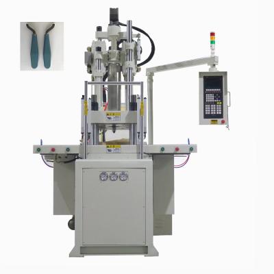 China Easy Operate Double Slide Vertical Injection Molding Machine For Making Hand Shank for sale