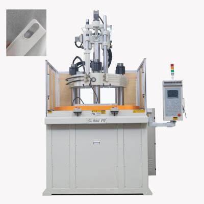 China Cheap Price Rotary Vertical Plastic Injection Molding Machine For Making Phone Cases for sale