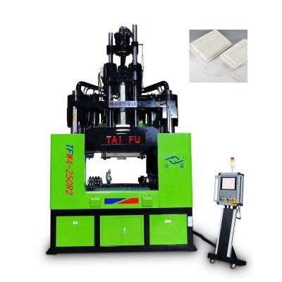 China 250 Ton Low Workbench Rotary Vertical Injection Molding Machine For Making Filter for sale