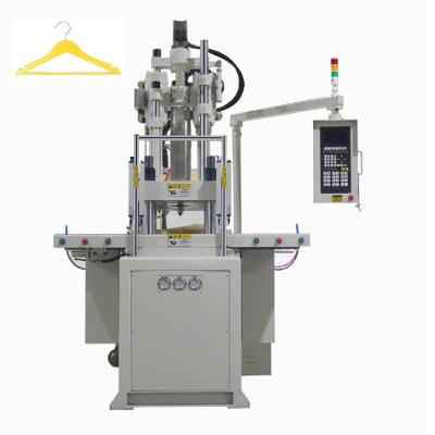 China 85 Ton Double Slide Vertical Injection Molding Machine For Making Hanger for sale