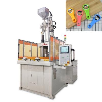 China Plastic Rotary Vertical Injection Molding Machine Making Bottle Opener for sale