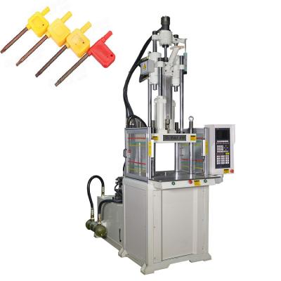 China Turning Holder Making Machine Vertical Plastic Injection Moulding Machine for sale