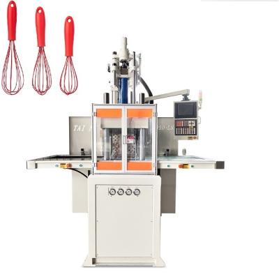 China Plastic Double Slide Egg Beater Making Machine Vertical Injection Moulding Machine for sale