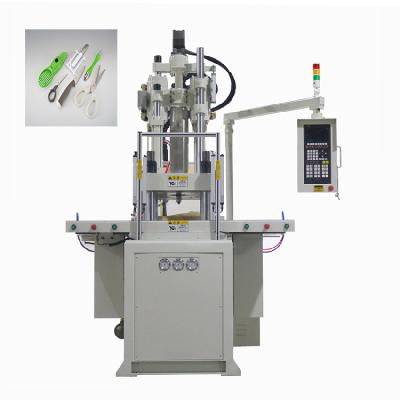 China 85 Ton Double Slide Vertical Injection Molding Machine For Making Cutter for sale