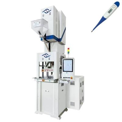 Chine Machine de moulage par injection verticale hybride à huile électrique pour la fabrication de boîtiers de thermomètres à vendre