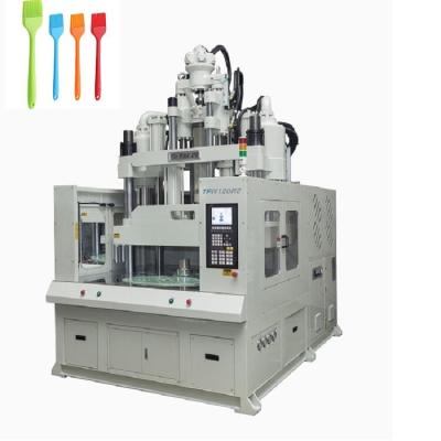 Cina 120 tonnellate Low Workbench Rotary Table Vertical Injection Molding Machine per la fabbricazione di spazzole per olio in vendita