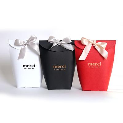 China Recyclable Waist Bow Decoration Customizable Gift Candy Wrapping Paper Bag for sale