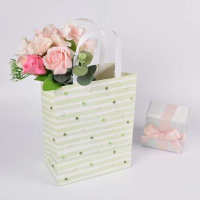 China Custom Eco-friendly Recycled Materials Packaging Gift Ivory Bag For Clothes Paper Bag Luxury Beige Cream Shopping Bag for sale