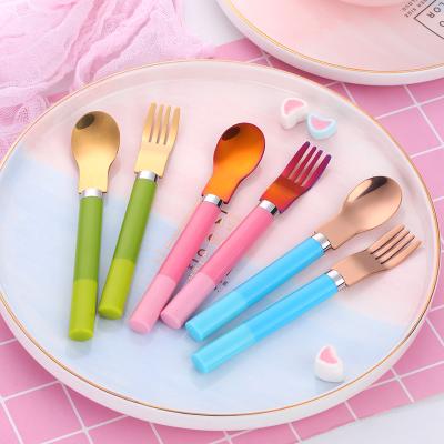 China Sustainable Sustainable Children Tableware Colorful Spoon And Stainless Steel Kids Bifurcating Cutlery With Plastic Handle for sale