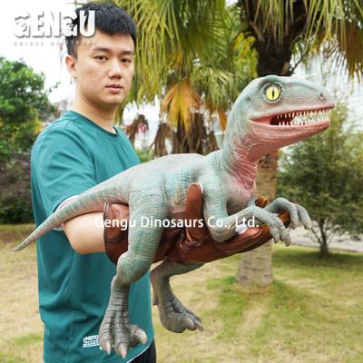 China Metal Dinosaur Hand Puppet Dinosaur Baby Rubber Animatronic Toy for sale