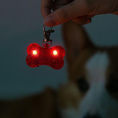 China Sustainable Pet Luminous Pendant Led Bone Jewelry Pendant Snap Dog Walking Artifact At Night To Prevent Losing Pet Products for sale