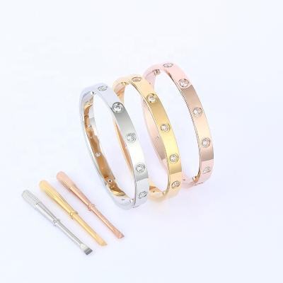 China Fast Delivery B0001 Fashion Ladies Jewelry Crystal Stone T Love Screw Brand Cuff Bracelet Bangle for sale